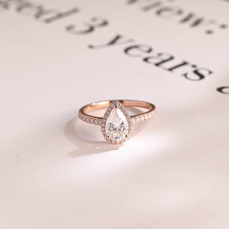 Stunning 1.0 - 2.0 CT Pear Moissanite Engagement Ring with Pave & Halo Design 1