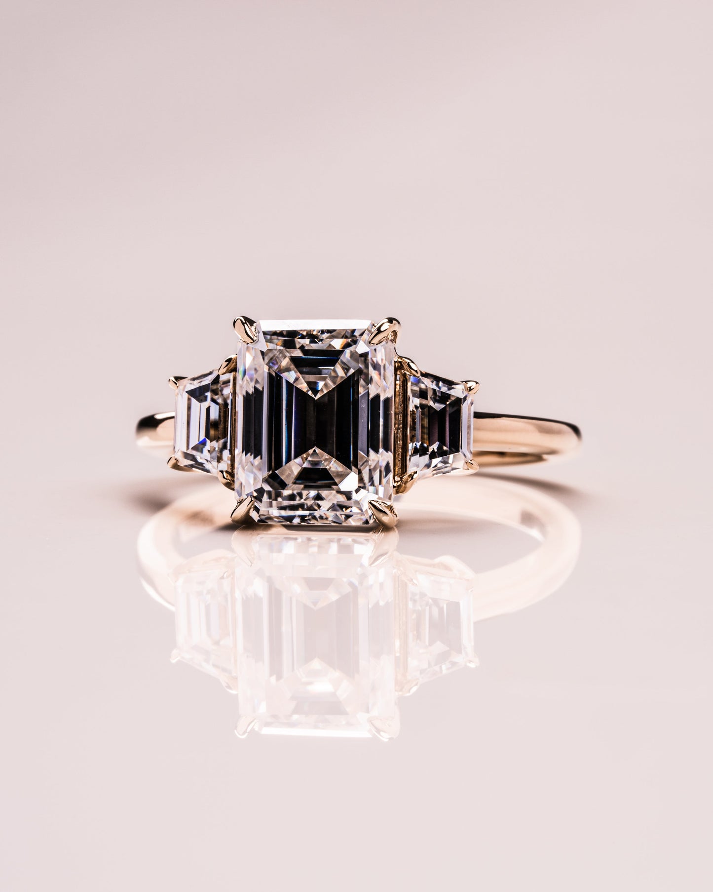 0.66 CT Emerald Cut Three Stone Moissanite Engagement Ring