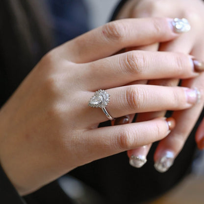 Stunning 1.0 - 2.0 CT Pear Moissanite Engagement Ring with Cluster Design 4