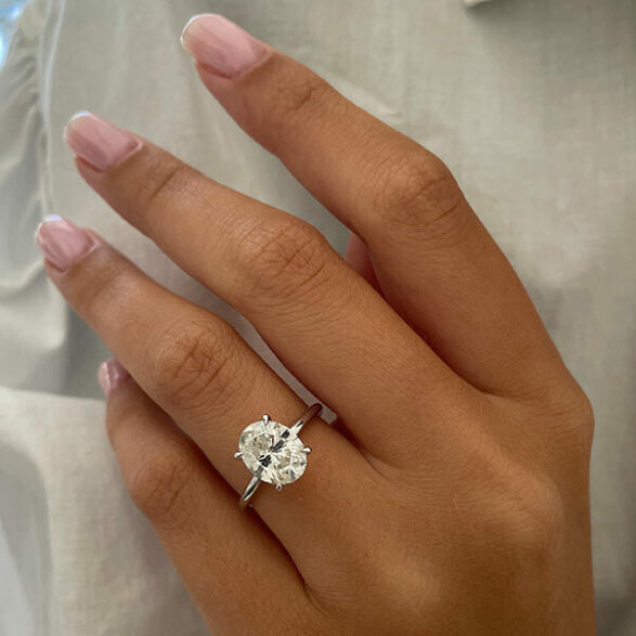 2.1 CT Oval Cut Solitaire Style Moissanite Engagement Ring