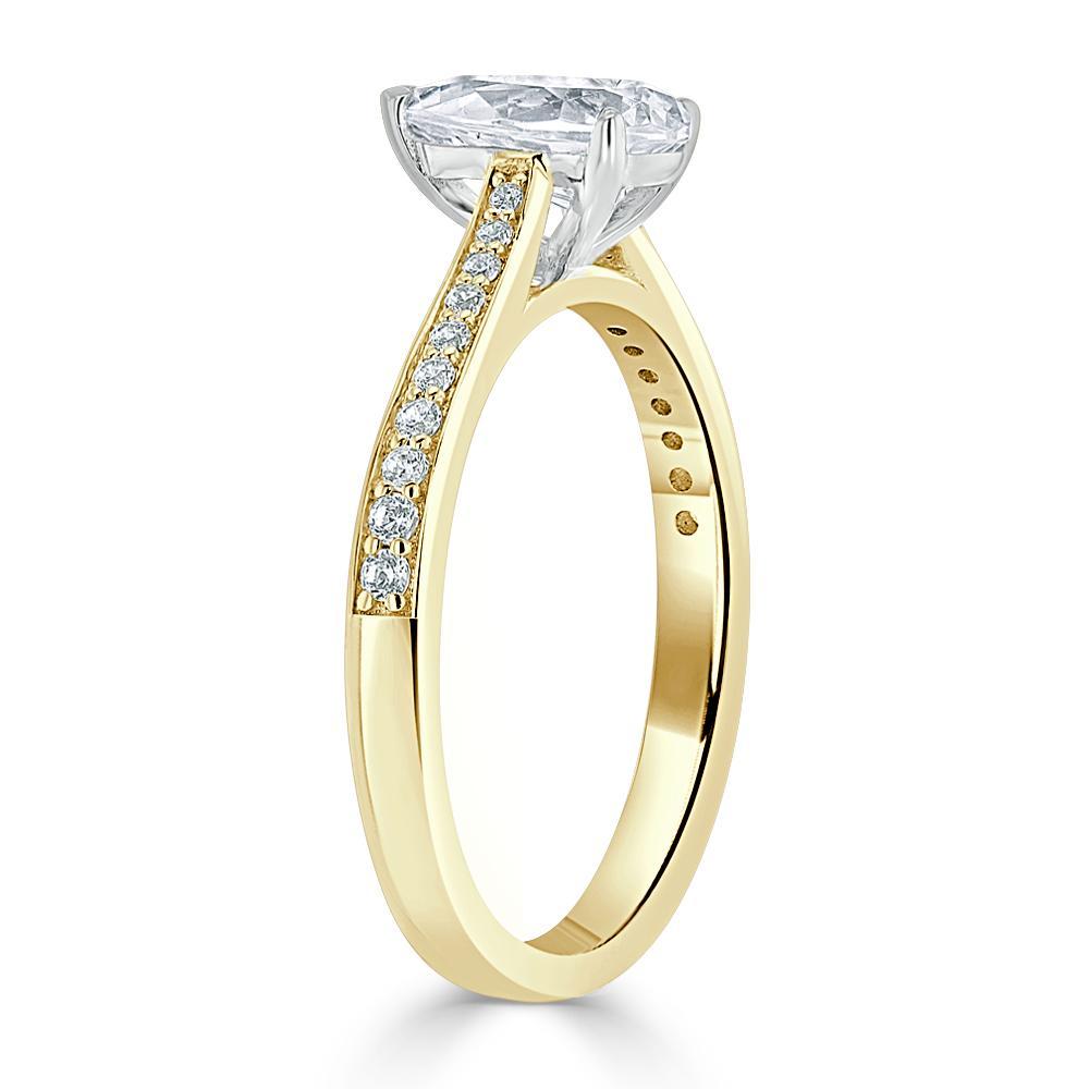 0.75 CT Pear Cut Solitaire Engagement Ring With Channel Pave Setting