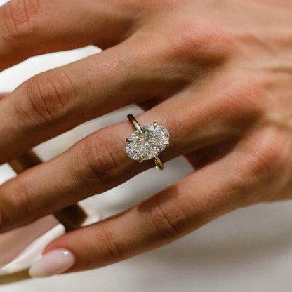 Oval Shaped Lab Grown Diamond Hidden Halo Engagement Ring