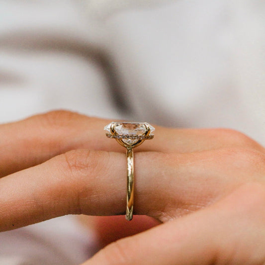 Oval Shaped Lab Grown Diamond Hidden Halo Engagement Ring