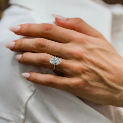 Oval Shaped Lab Grown Diamond Hidden Halo Engagement Ring