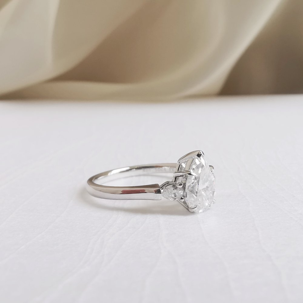 1.50 CT Pear Shaped Moissanite Three Stone Engagement Ring