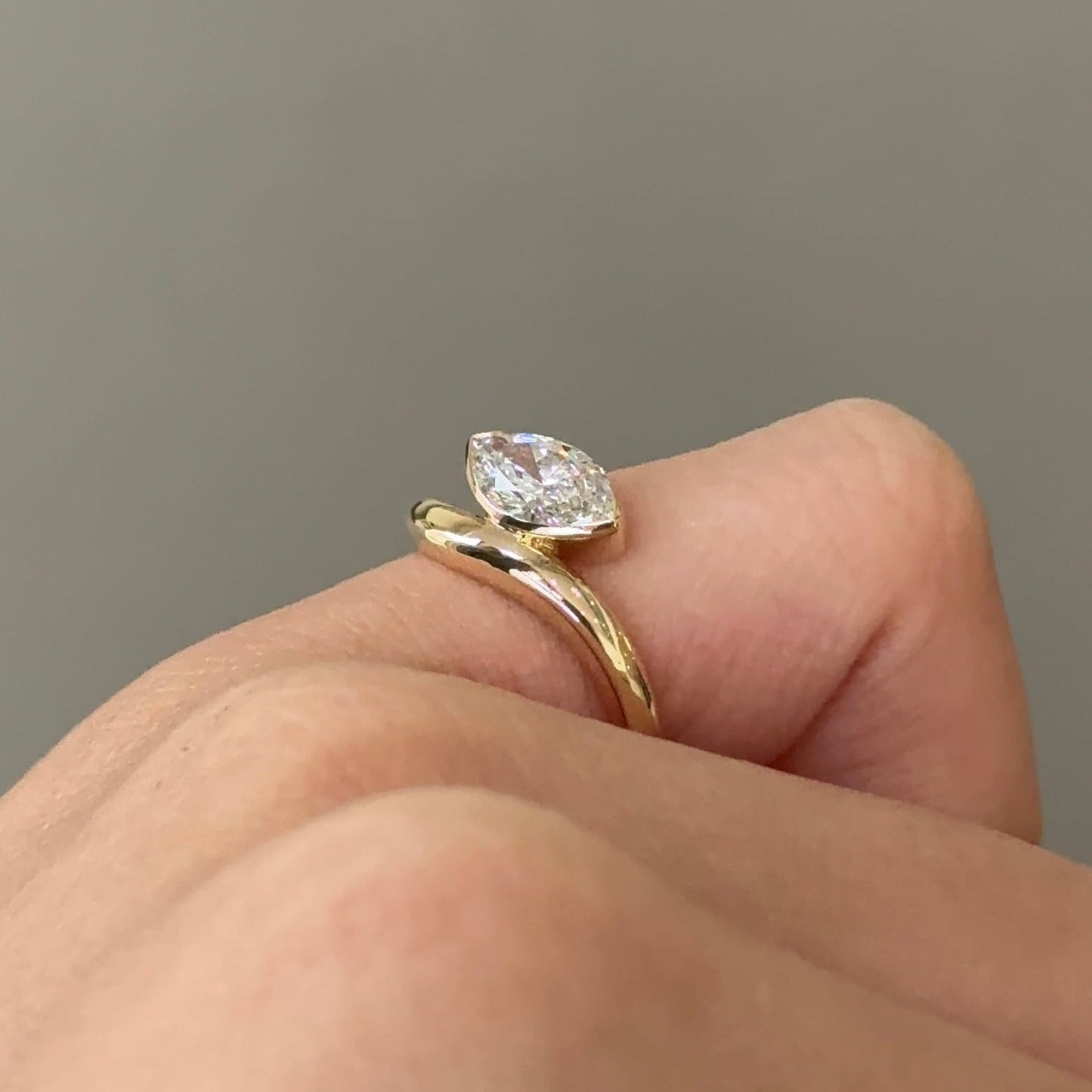 0.71 CT Marquise Half Bezel Curved Solitaire Lab-Grown Diamond Engagement Ring