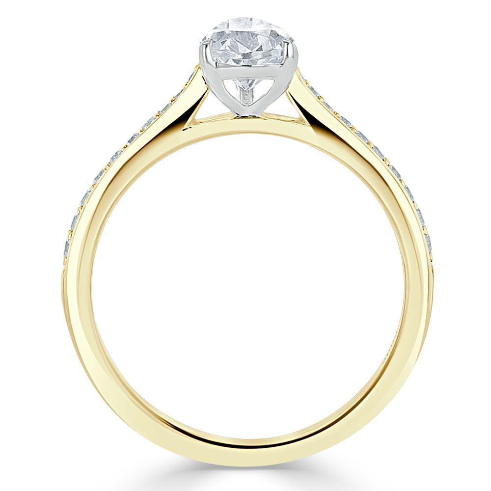 0.75 CT Pear Cut Solitaire Engagement Ring With Channel Pave Setting