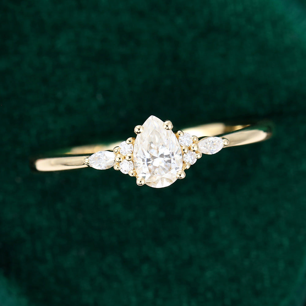 0.69 CT Pear Shaped Moissanite Cluster Engagement Ring