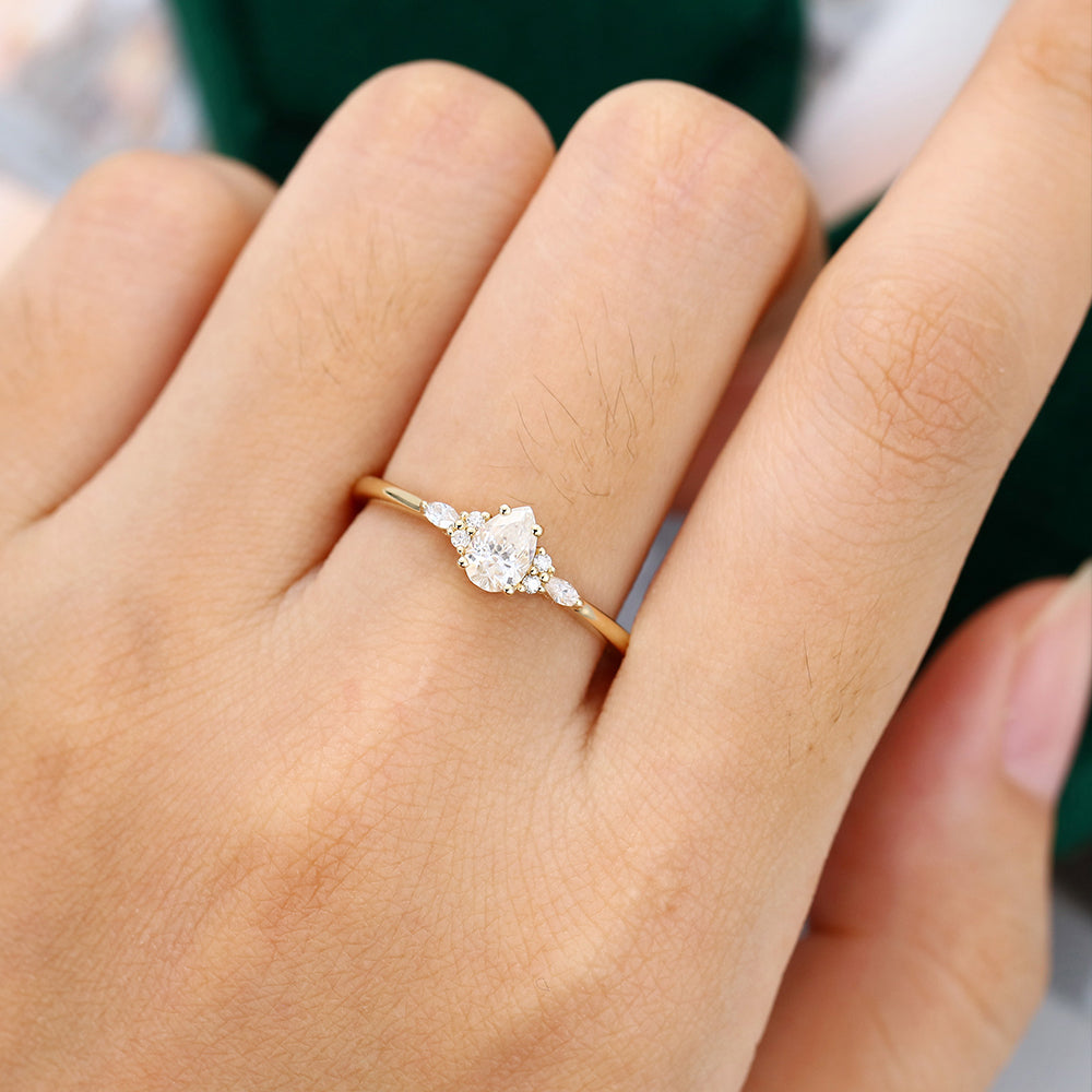 0.69 CT Pear Shaped Moissanite Cluster Engagement Ring