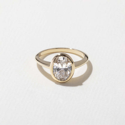Oval Lab Grown Diamond Bezel Solitaire Engagement Ring