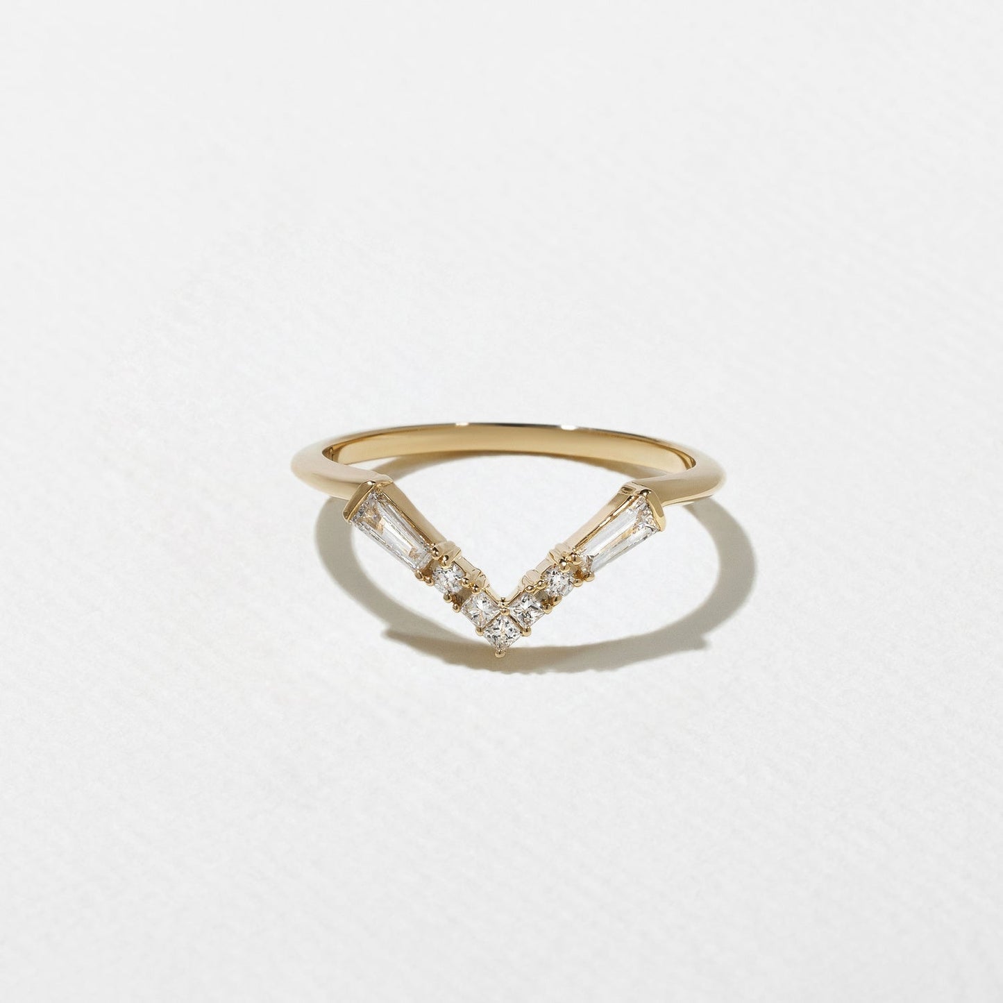 0.25 TCW Round, Tapered baguette & Princess- V Shape Wedding Band