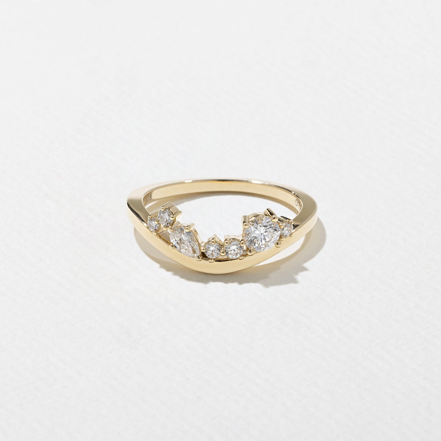 0.35 TCW Round & Pear- Curved Wedding Band