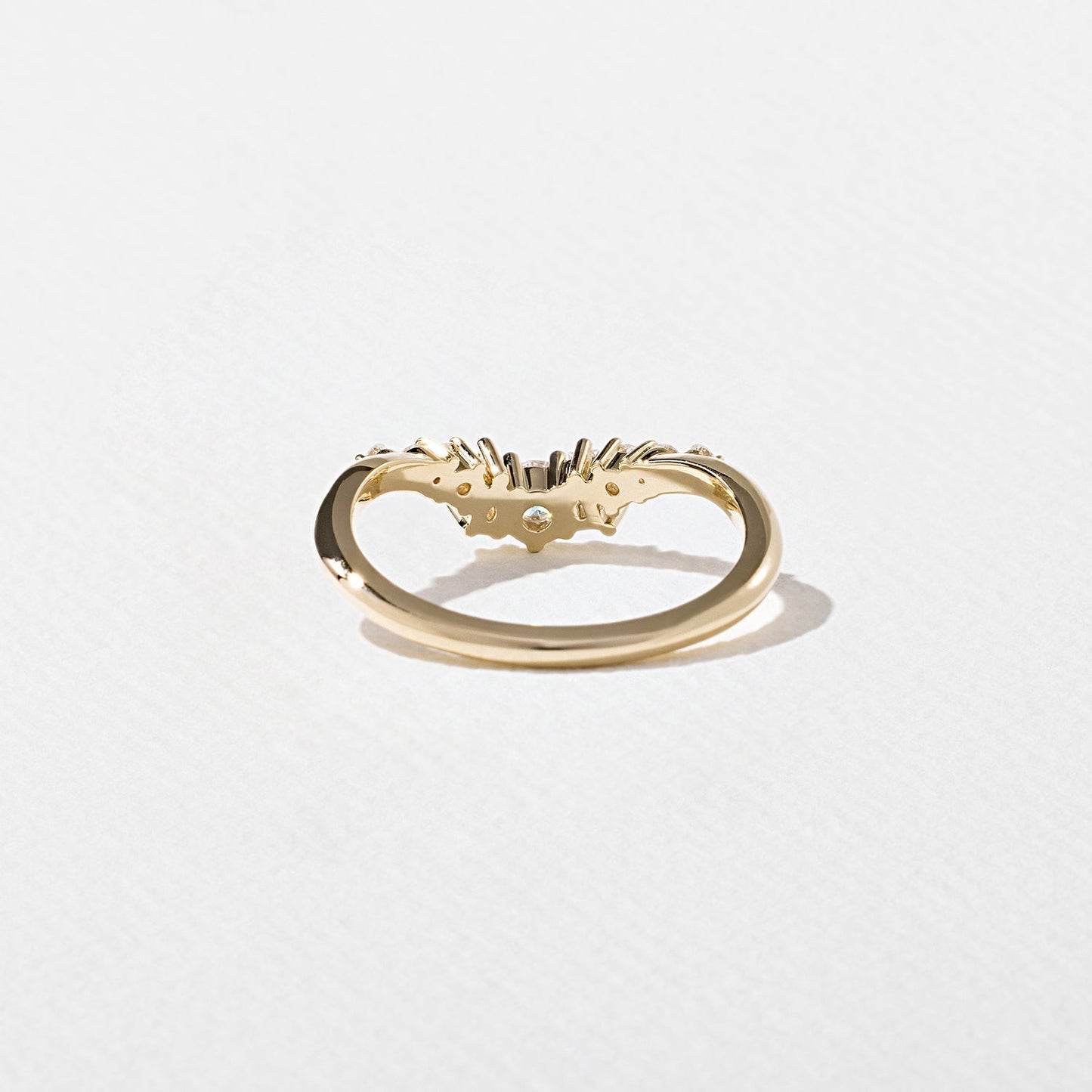 0.34 TCW Round, Tapered baguette & Pear- Curved Wedding Band
