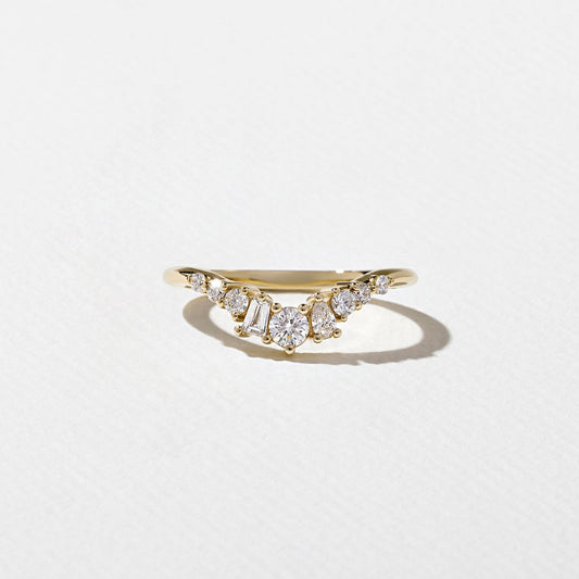 0.34 TCW Round, Tapered baguette & Pear- Curved Wedding Band