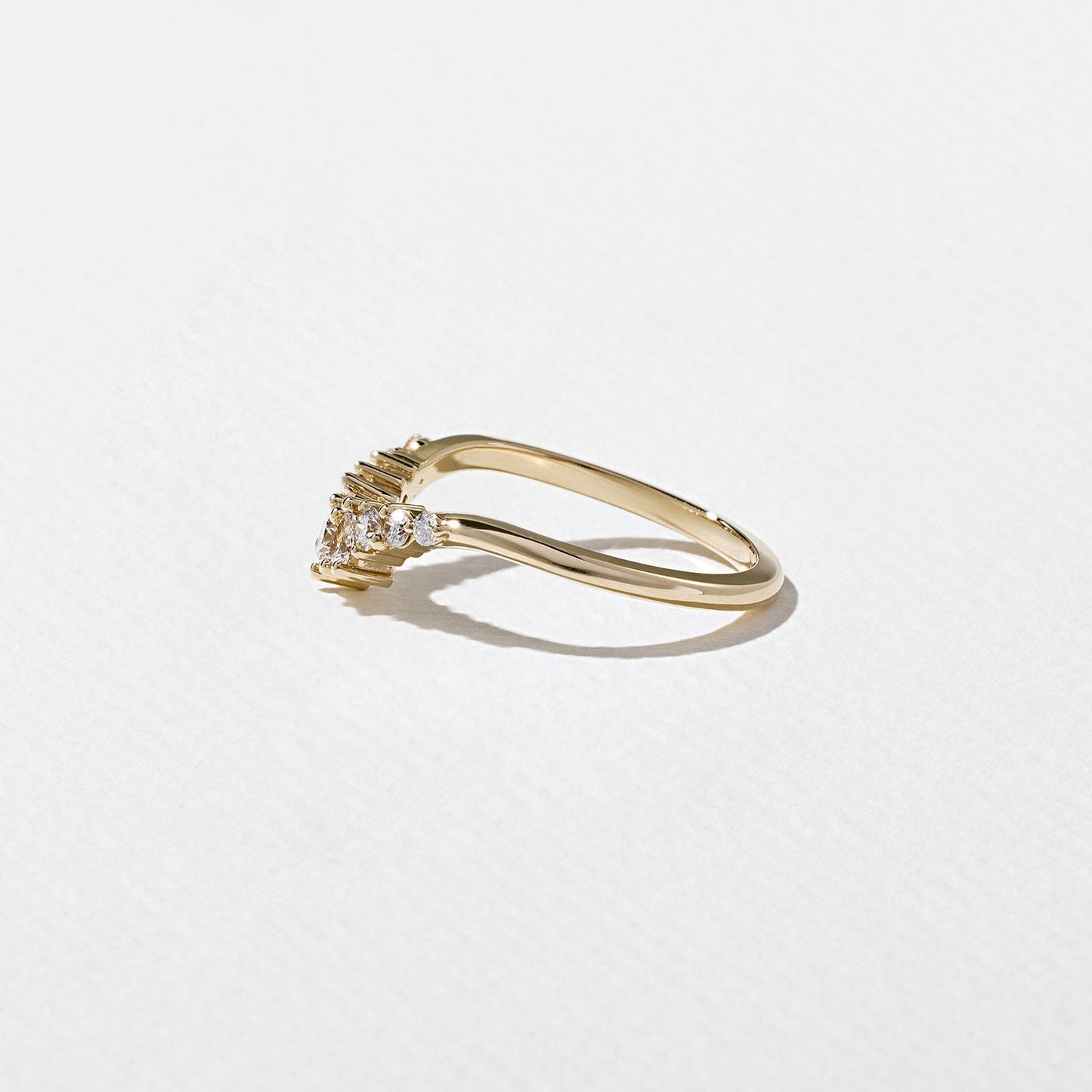 0.34 TCW Round, Tapered baguette & Pear- Curved Wedding Band