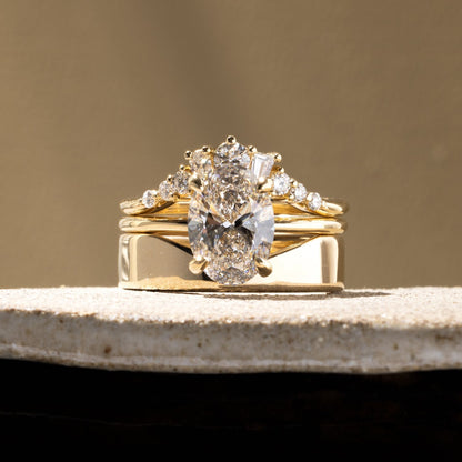 0.34 TCW Round, Tapered baguette & Pear- Curved Wedding Band