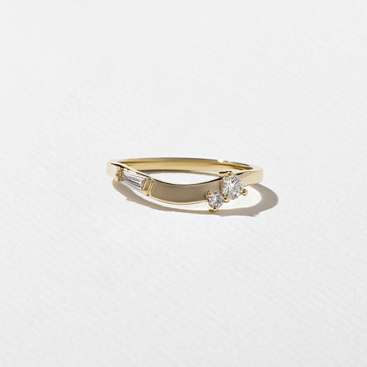 0.23 TCW Round, Tapered Baguette, and Pear unique Wedding Band
