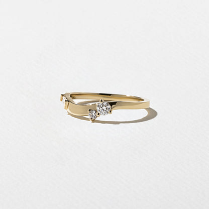 0.23 TCW Round, Tapered Baguette, and Pear unique Wedding Band