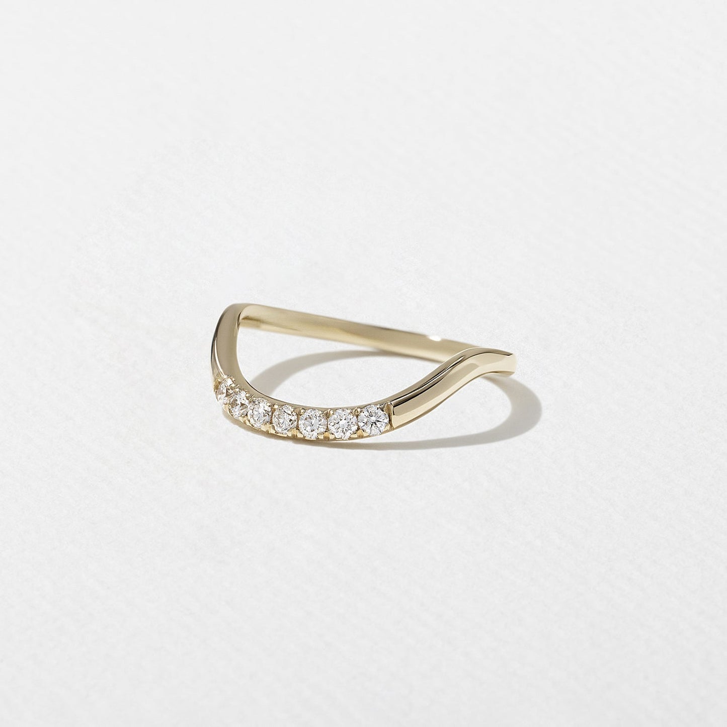 0.14 TCW Round Shape Unique Curved Wedding Band