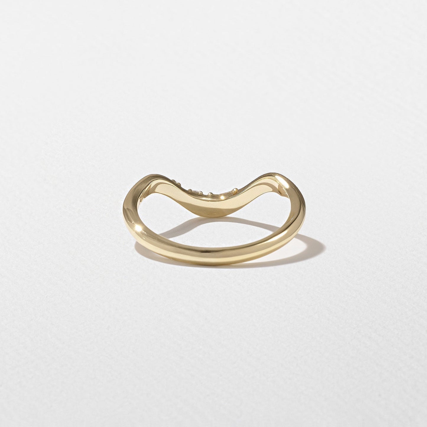 0.10 TCW Round Shape Unique Curved Wedding Band