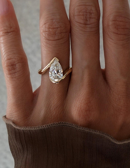 3 CT Pear Shaped Lab Grown Diamond Bypass Style Engagement Ring